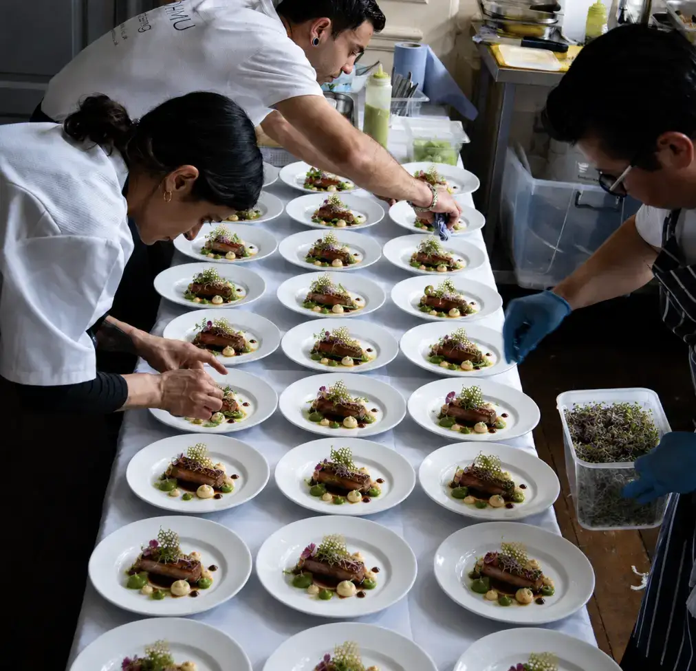 Domu chefs plating a fine dining event in Kent